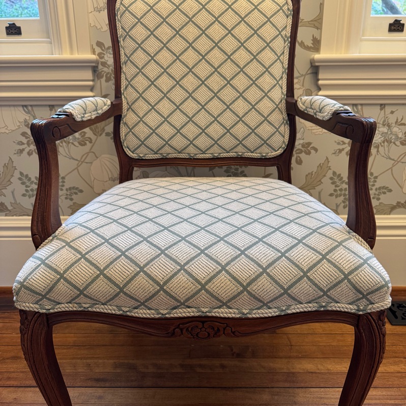 Louis XV-style Ethan Allen armchairs in blue lattice.